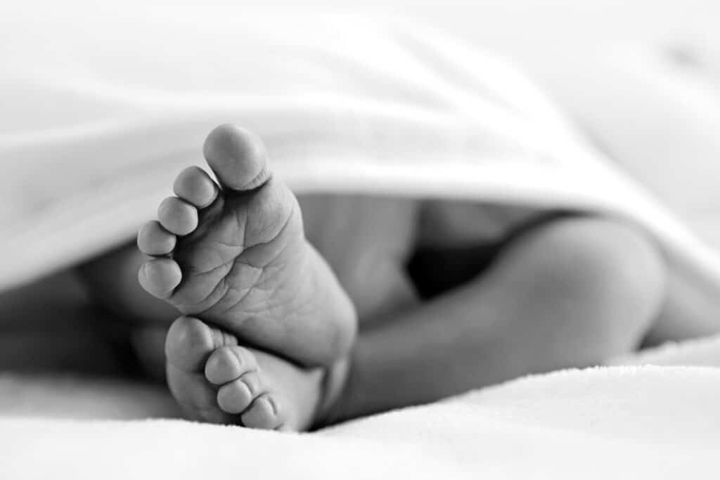 Newborn Feet In Black And White