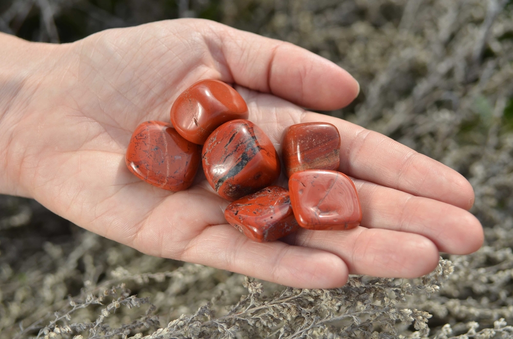 natural-stone-red-jasper-in-female-hand