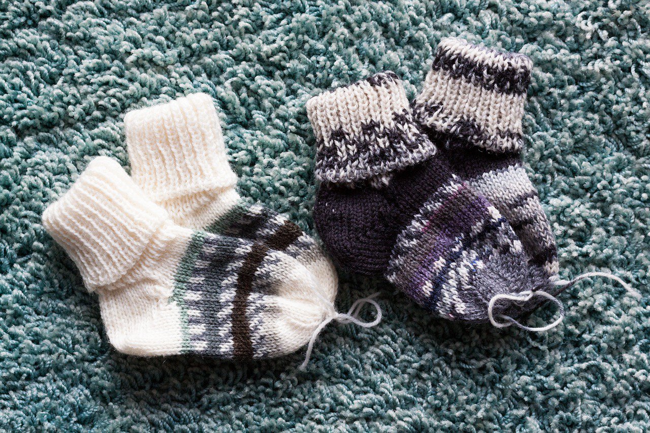 two pairs of baby socks